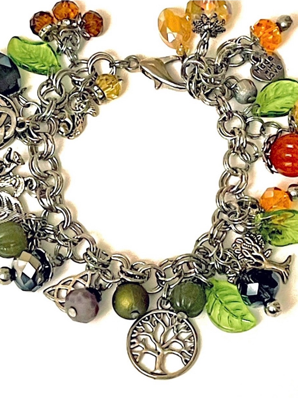 Artisan Charm Bracelet with Green and Orange Accents mystical charms